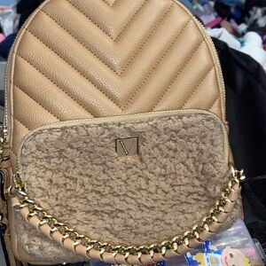 Victoria secret mini backpack purse. No I will not send pictures to your email!!
